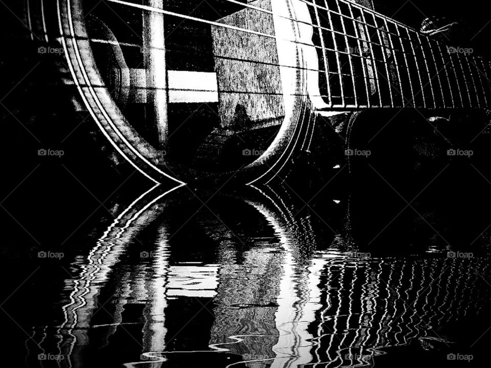 black-and-white guitar. Reflection