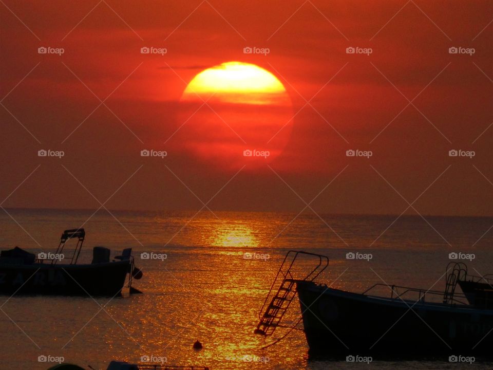 Sunset over Praia ( Italy ).