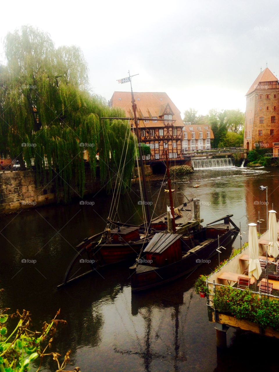 Fishing Boats at Luneburg . Scenic Germany on misty morning. 