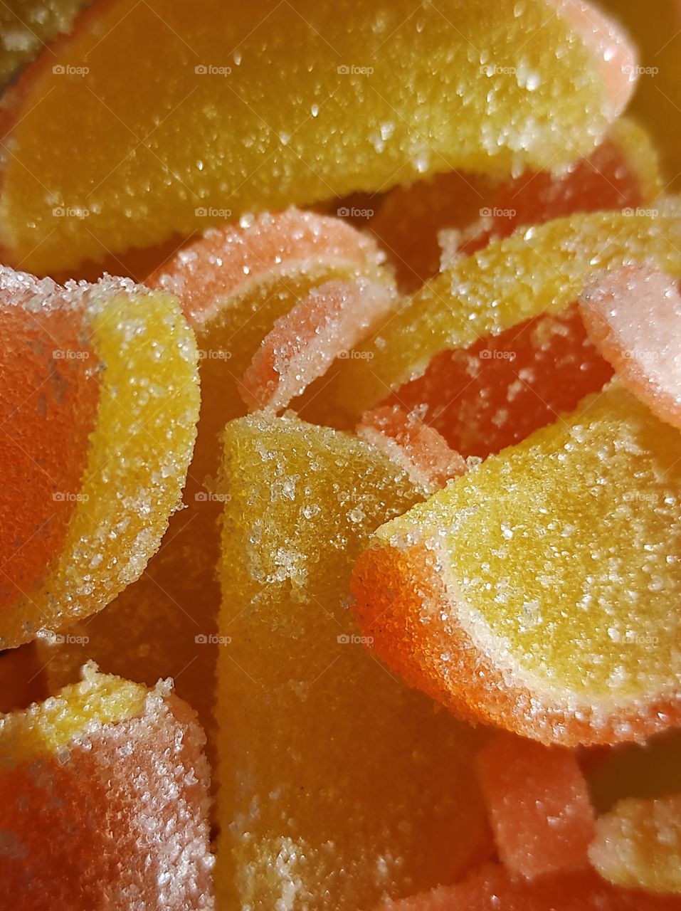 Fruit jelly in the form of citrus fruits close-up