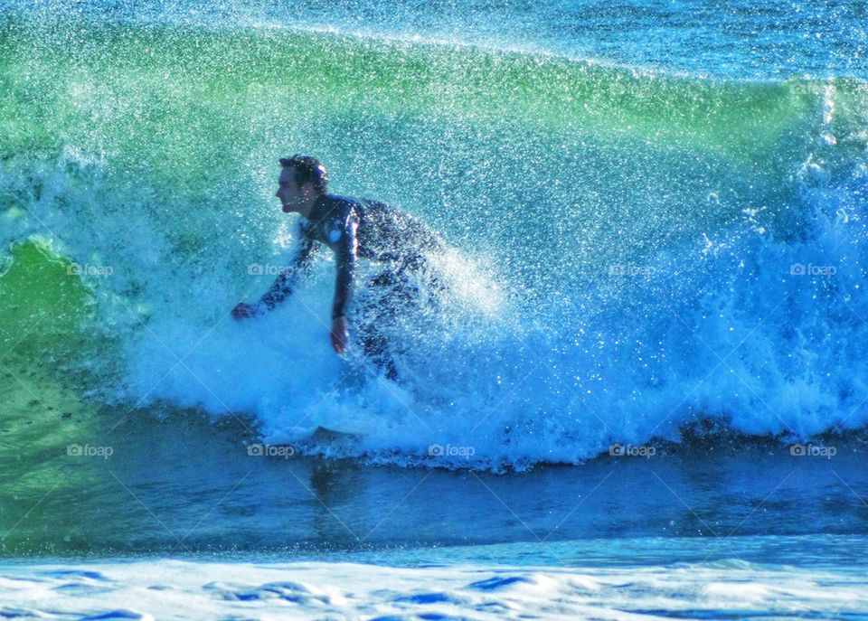 Skillful Surfer Riding A Wave Crest. California Surfing
