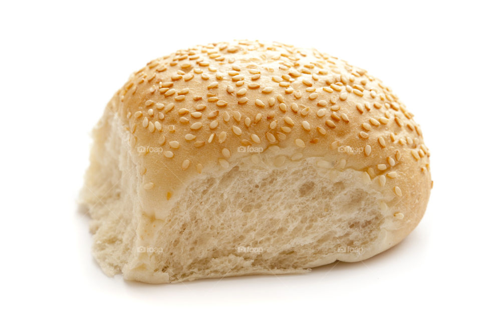 Bread with sesame on white background