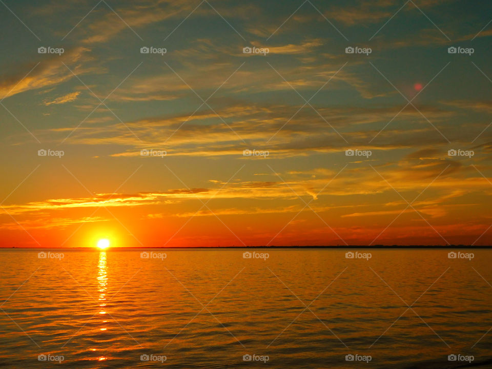 Scenic view of sunset over sea