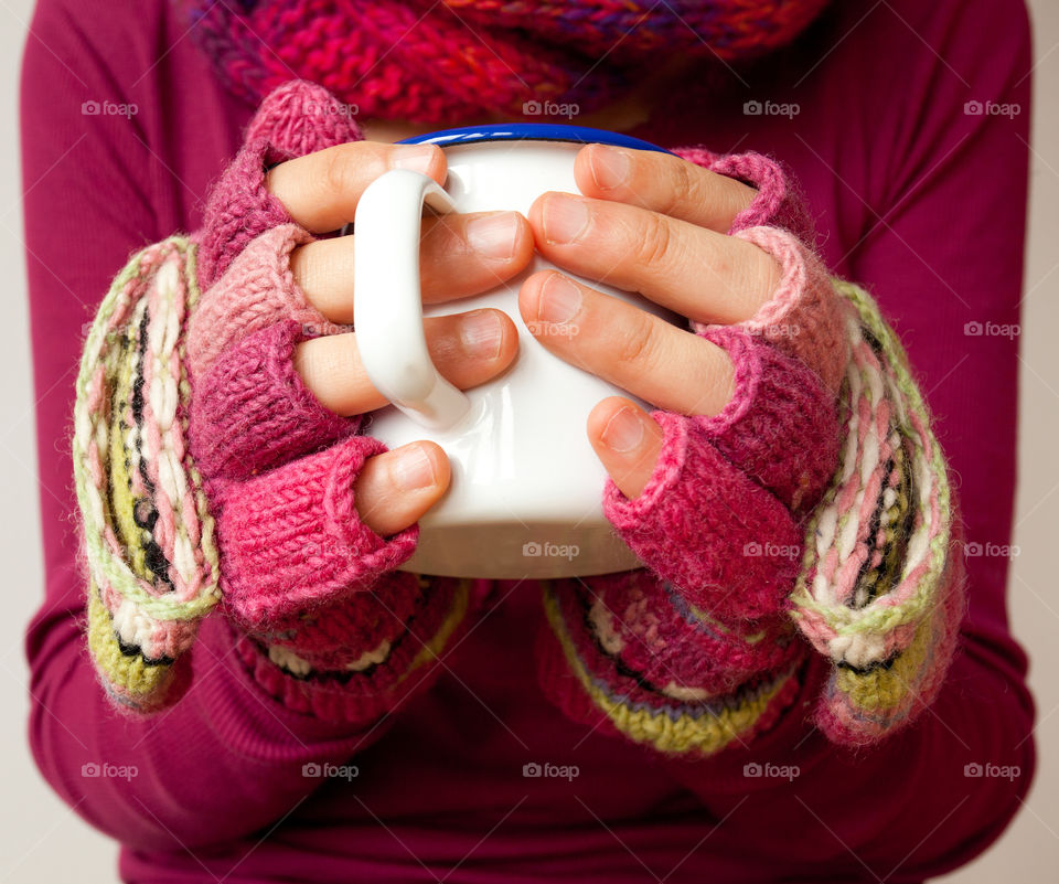 Holding a cup of soup