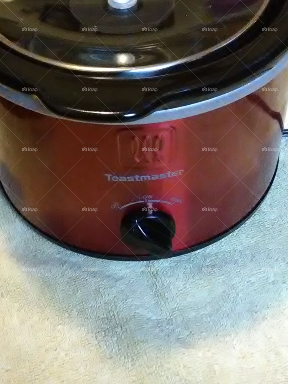 a small crock pot vintage included in the album