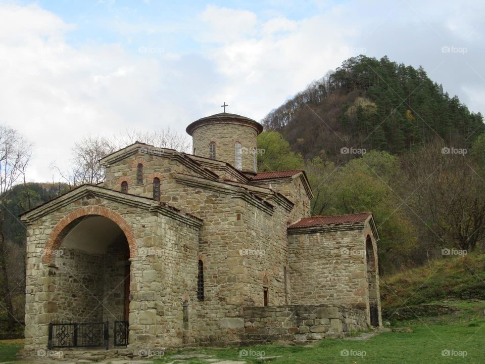 ancient dilapidated temple in the Caucasus in Russia