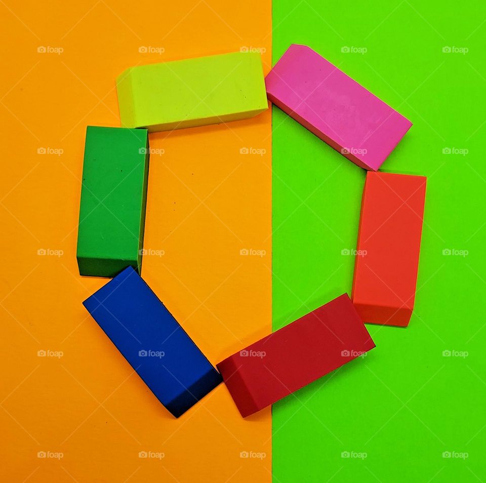 Rectangles in many colors spelling out the letter O