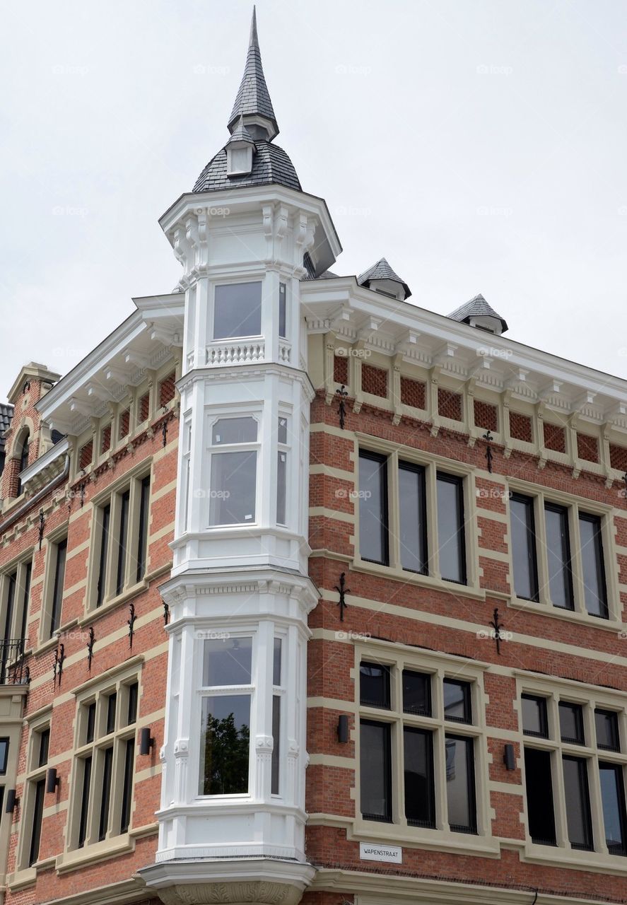 House with white tower