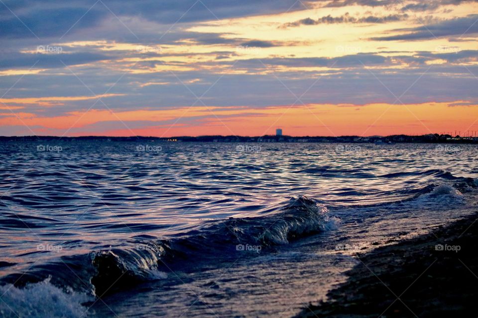 Down on the beach overlooking the city