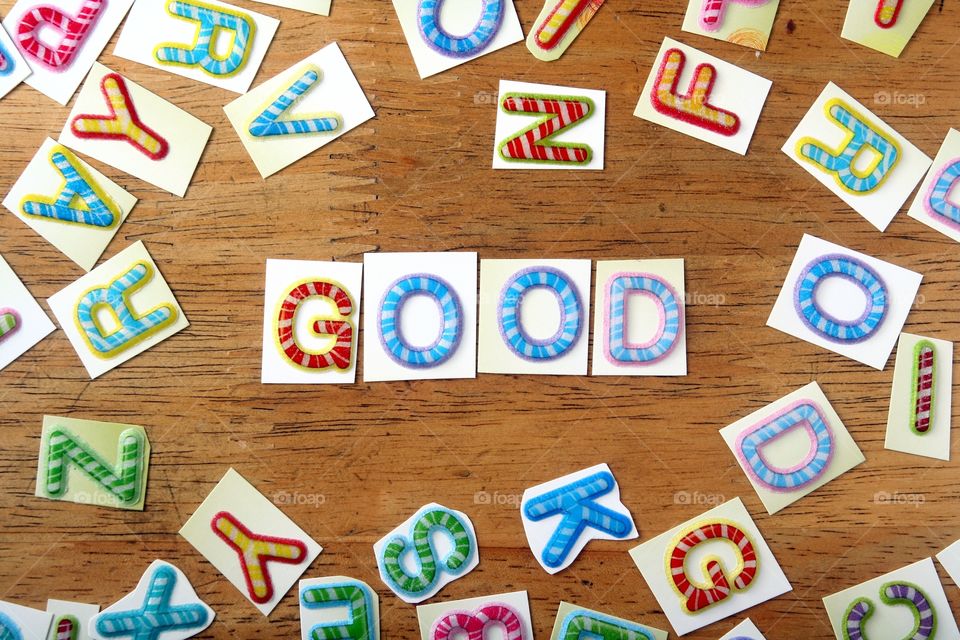 word good in colorful letter. word good spelled in colorful letters