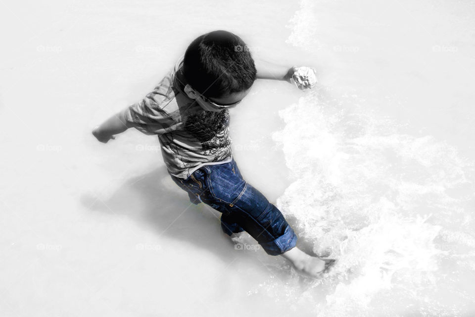 child water playing boy by uzzidaman