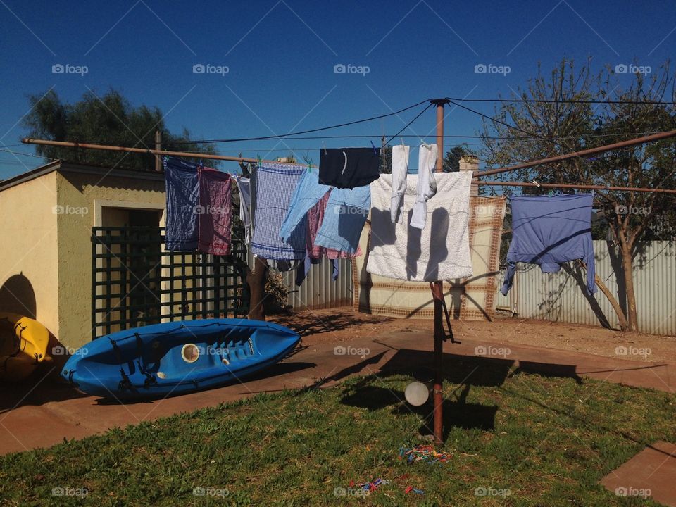 South Australia backyard 1930s house. Whyalla South Australia back yard 1930s house. Clothes line, outhouse, kayak