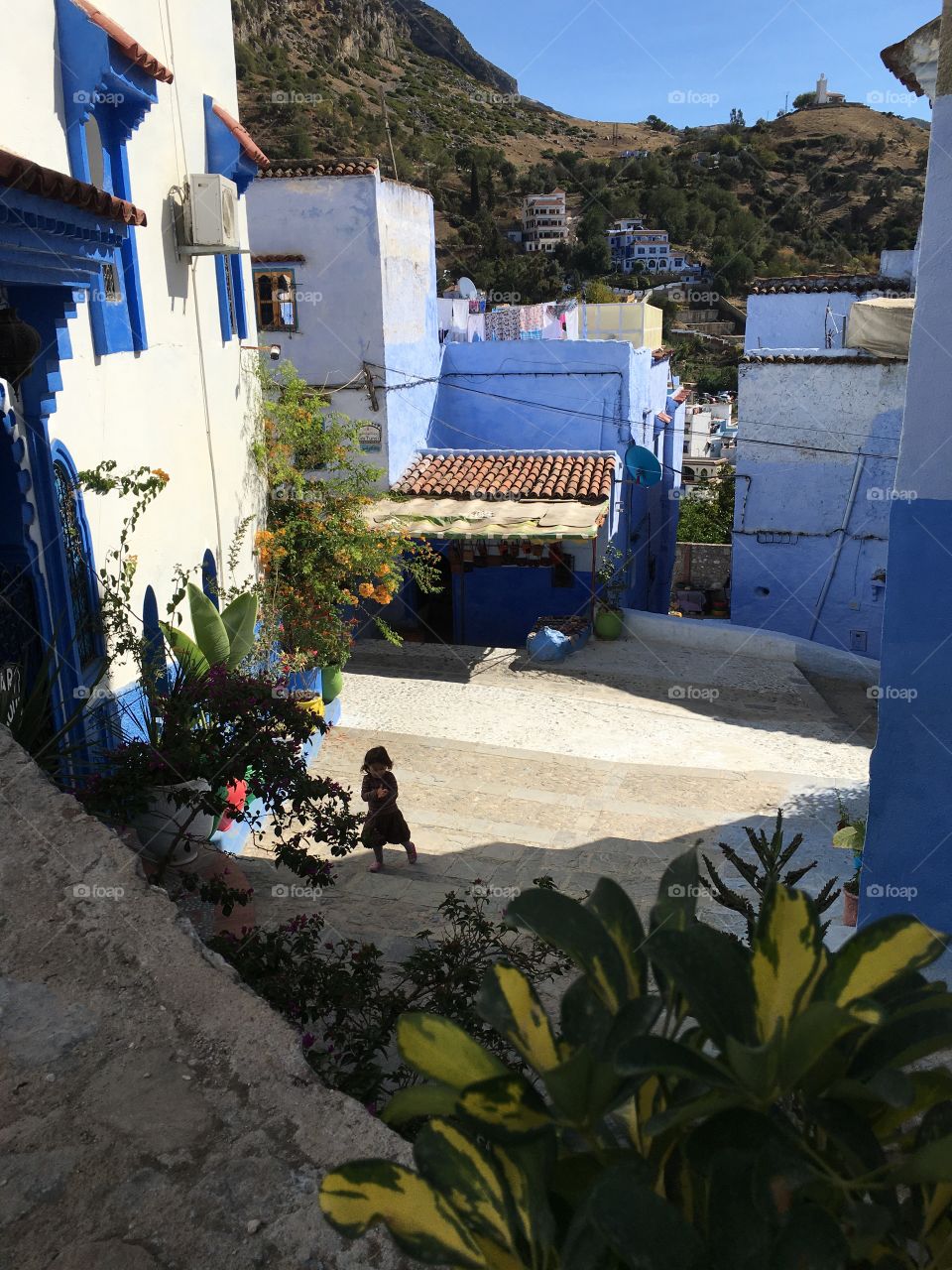 Sweet little angel is coming from the blue city of Chefchaouen 