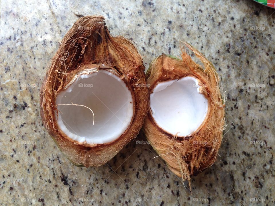 High angle view of broken coconut
