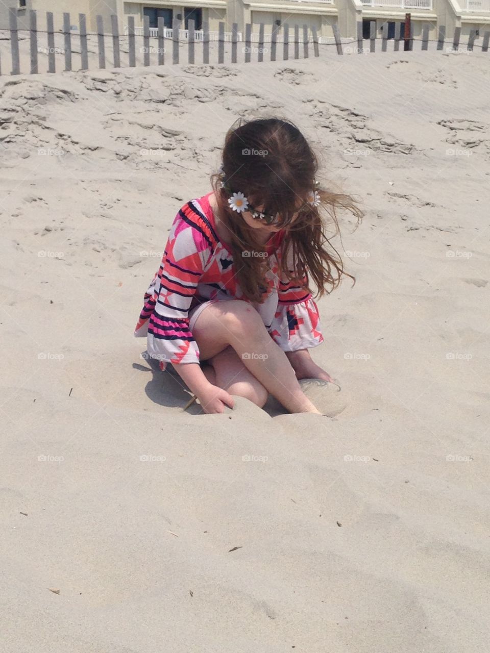 Feet in the sand . Enjoying a beautiful day on the beach 