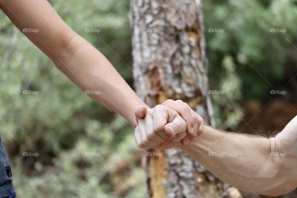 Father hand support his son