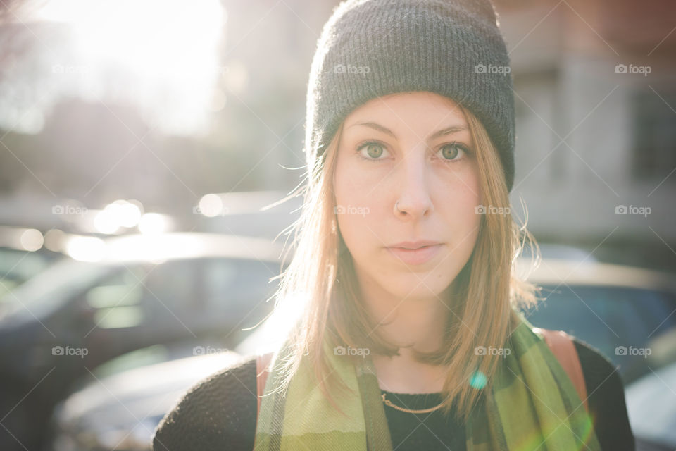 portrait of beautiful young woman in the street of Milan