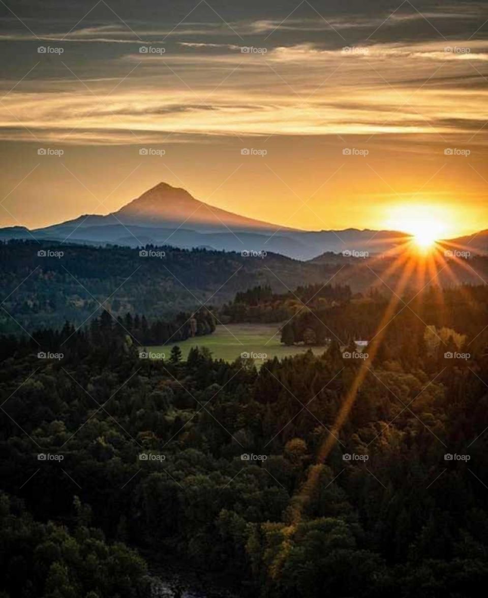 valley sunset on an overcast day