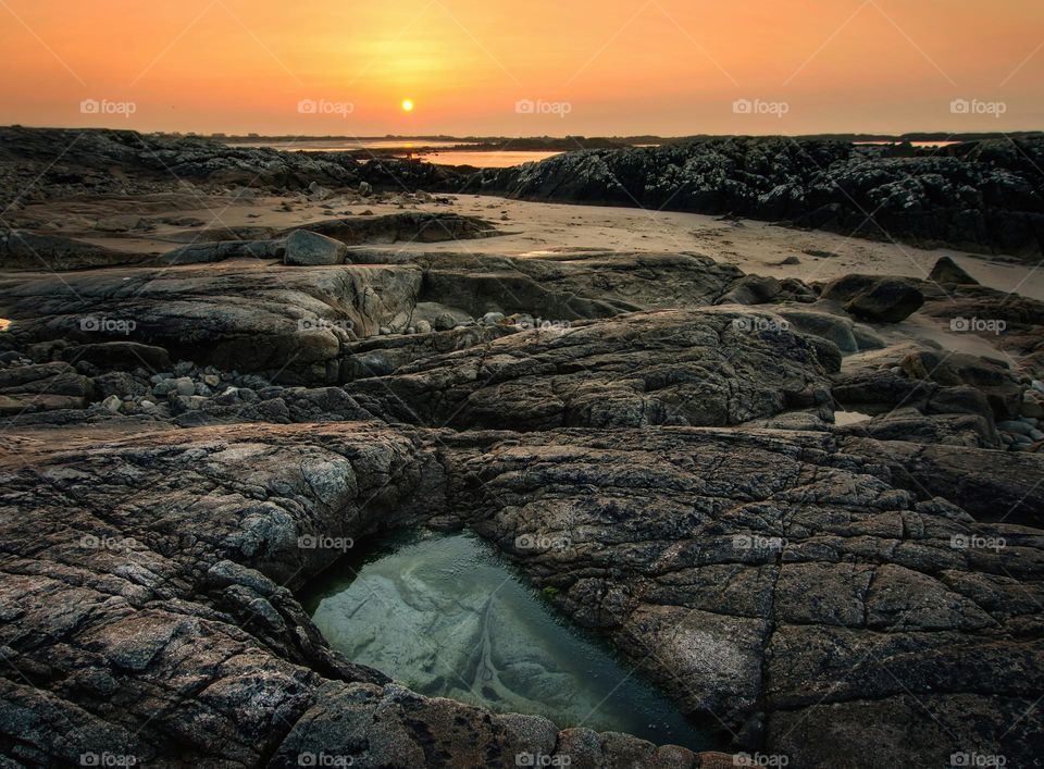 Sunrise at Seaweed beach in county Galway, Ireland