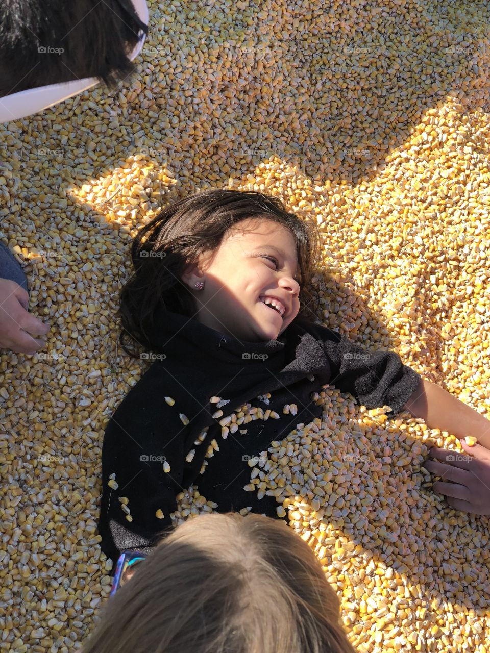 Laughing in the corn