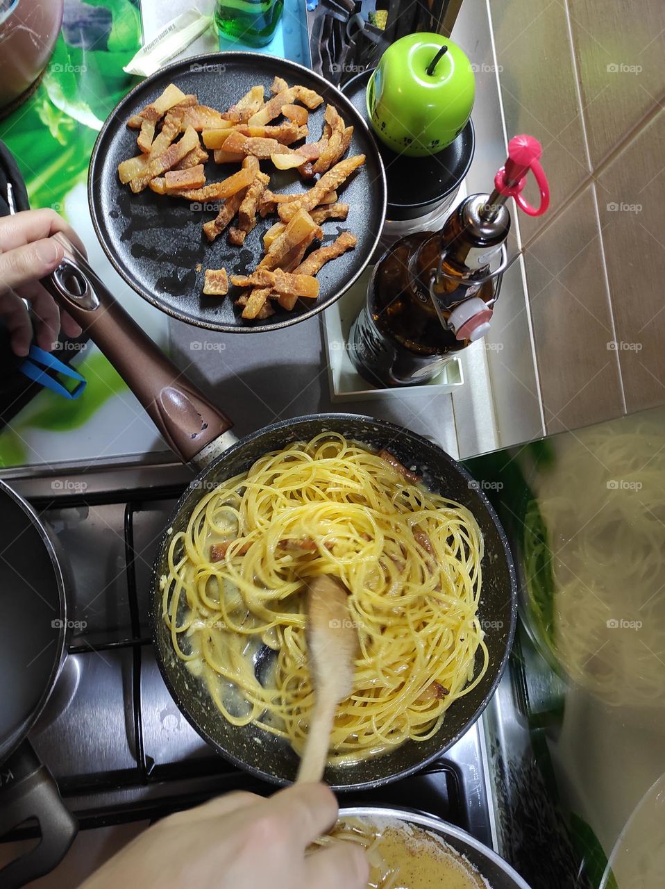 pasta carbonara being prepared