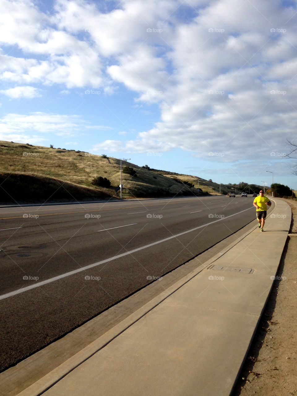 A morning jog on the sidewalk in summer!