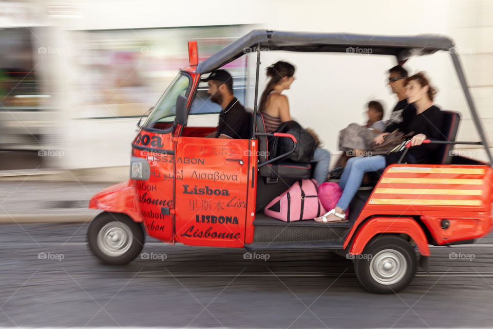 Colorful tuk tuk on a street in Lisbon, Portugal