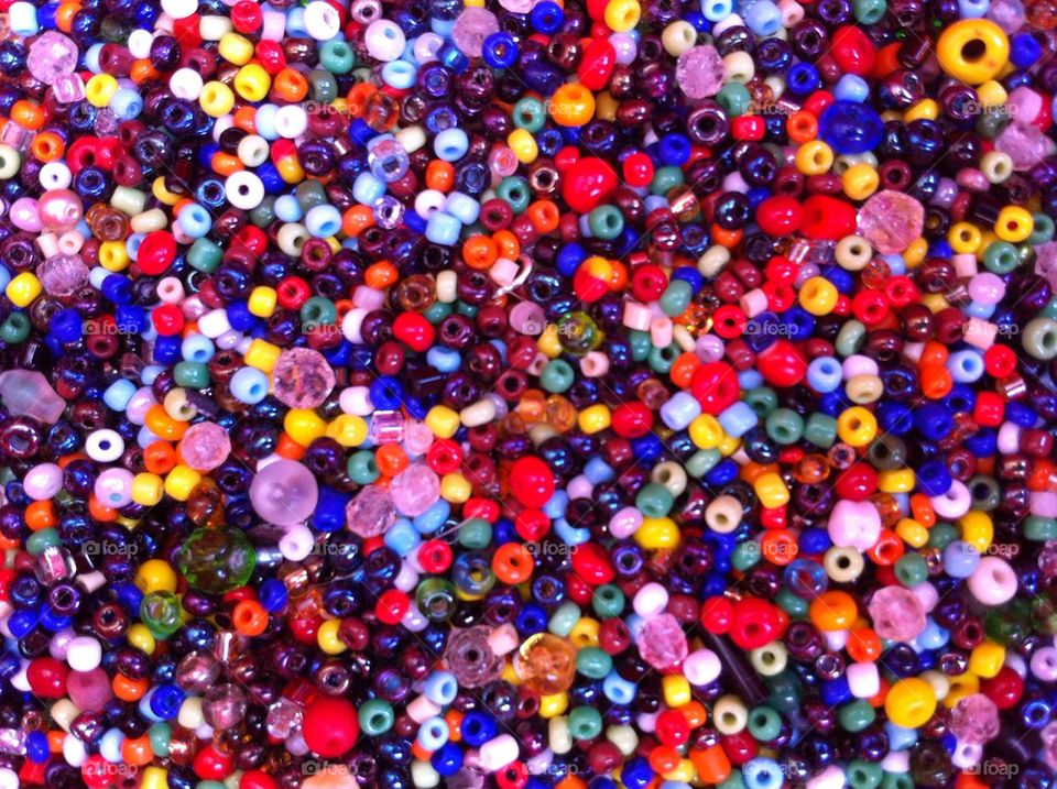 Plastic pearls in assorted colors.