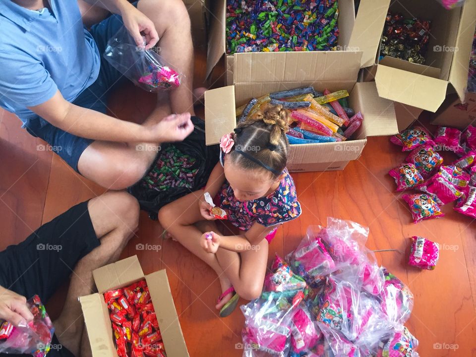 Packing candy for needy children