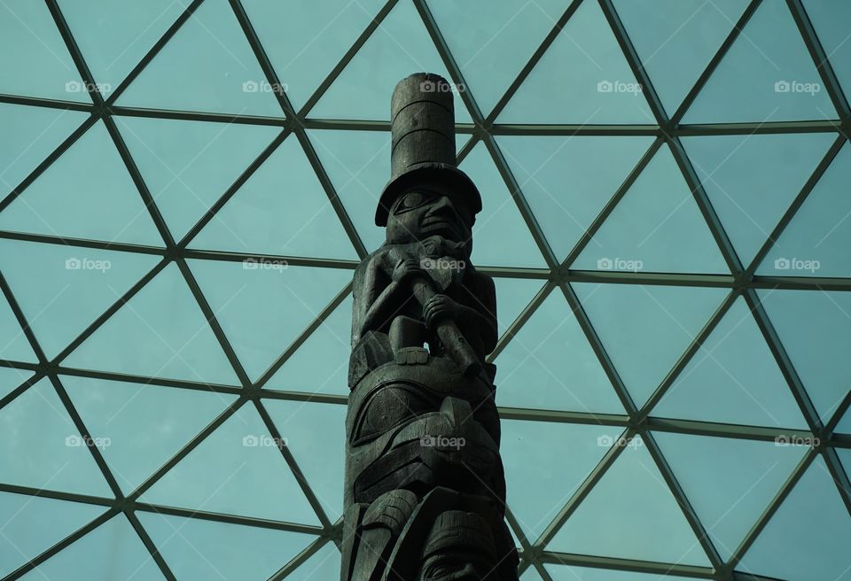 Totem Pole ... surrounded by a glass roof 