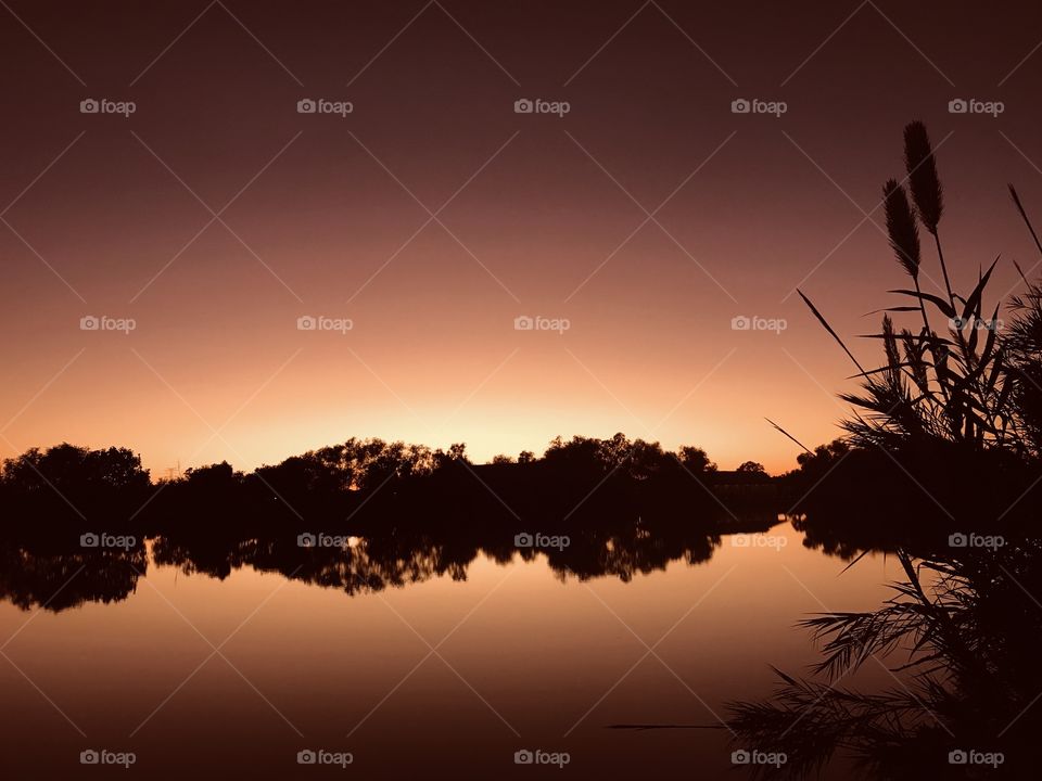 A Beautiful Evening on the Lake Sunset Done for the Day. Cool Evening in the works Twilight moving ahead the Night is Nearing and The Day will be done.