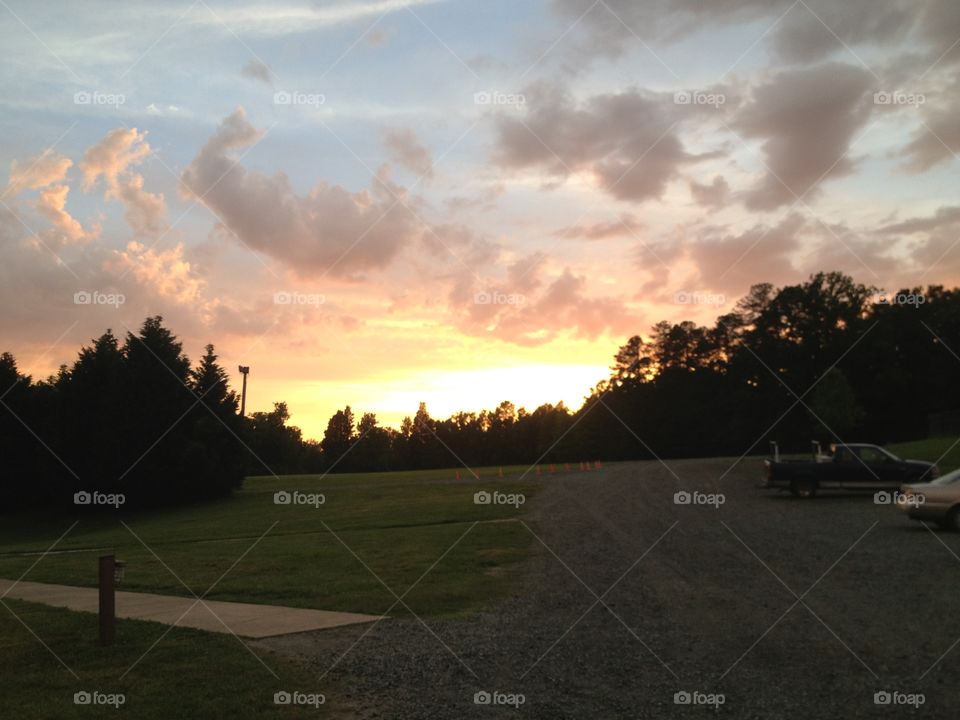 Sunset over the grass. Pittsboro NC sunset