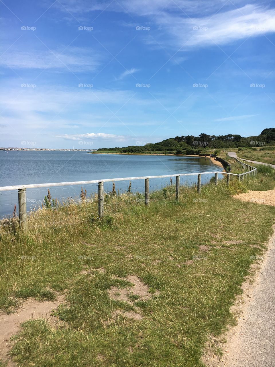 Scenic view of sea by cliff