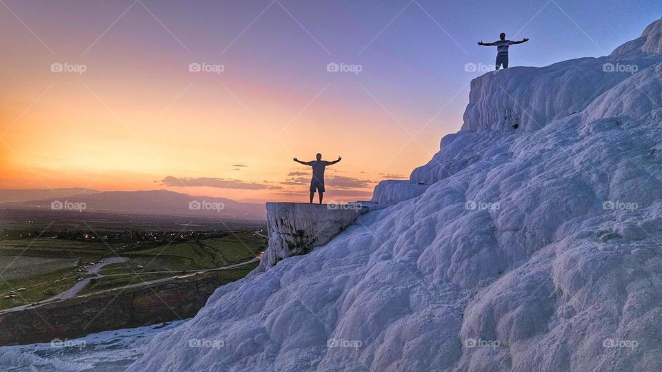 sunset on mineral travertine slopes