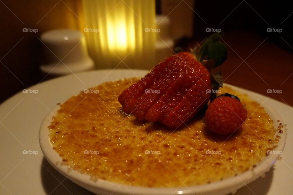 Creme brûlée with yellow light. Golden yellow 