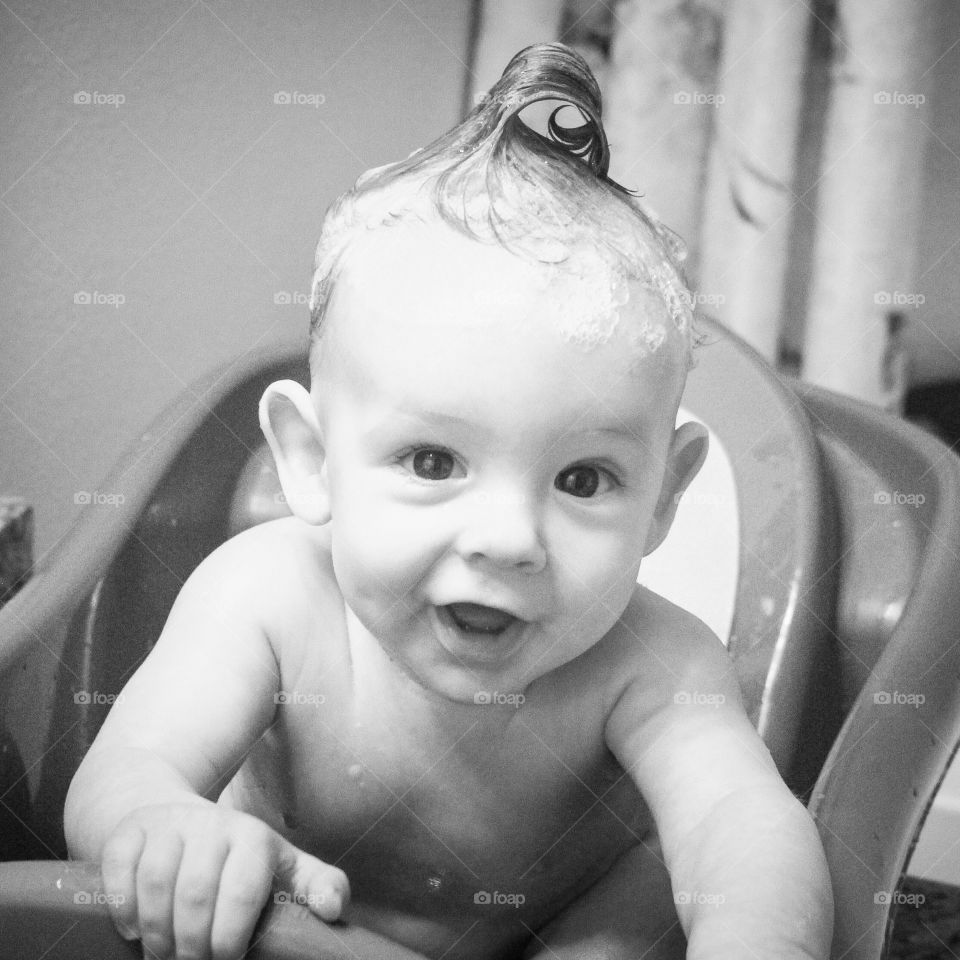 Portrait of a boy while bathing