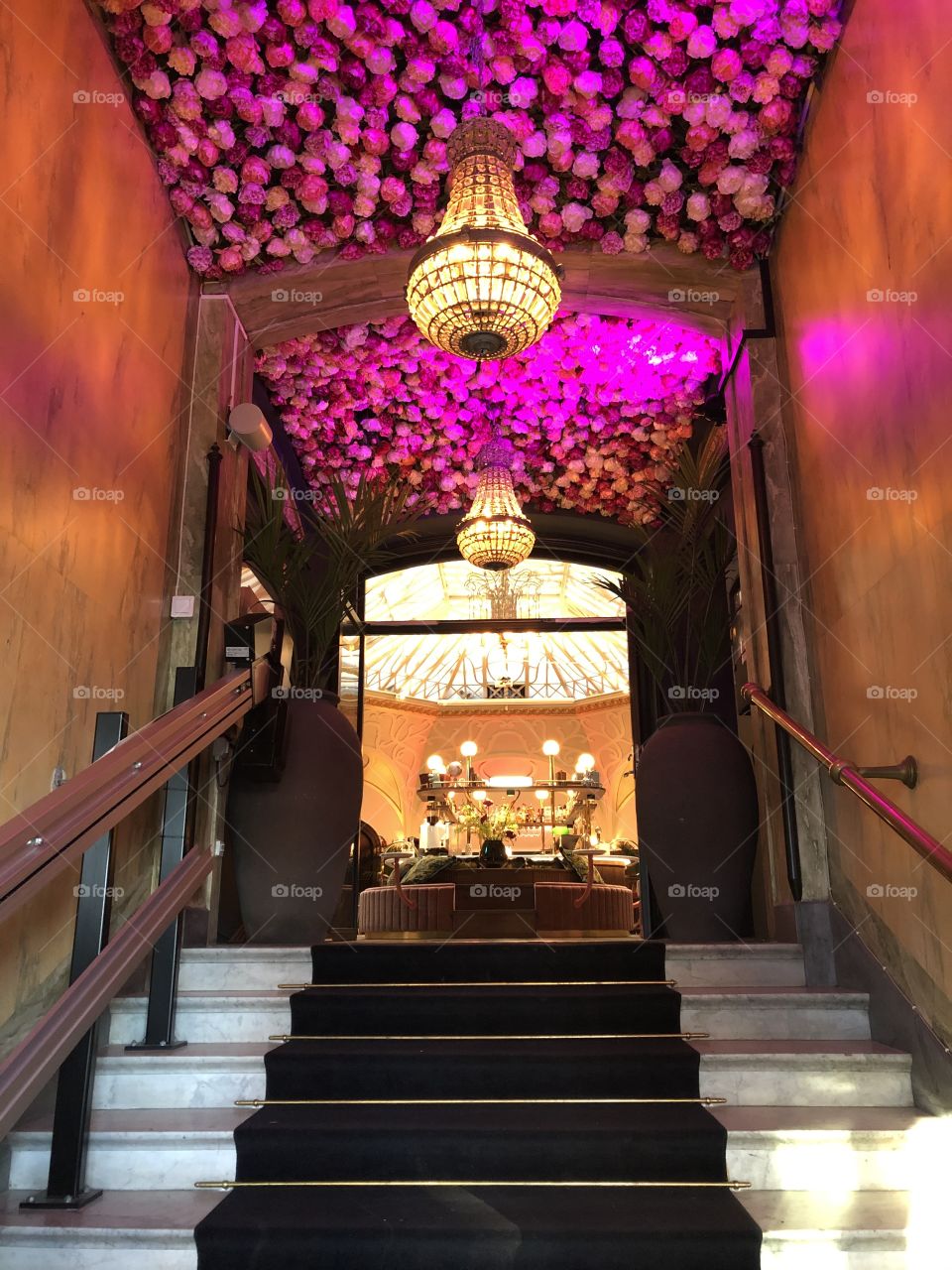 Entrance with pink chandalier