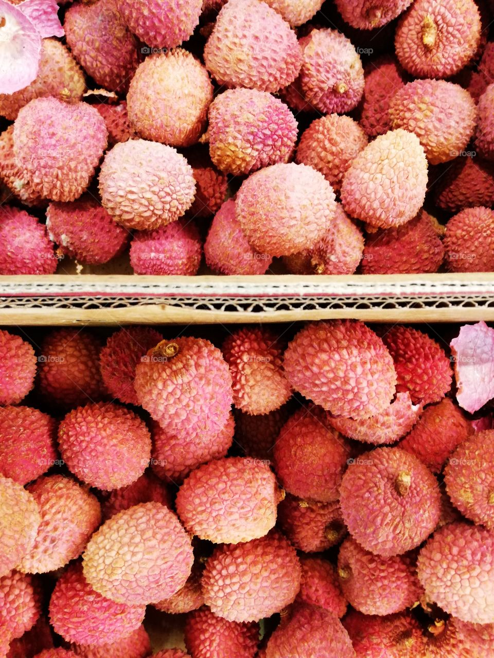 High angle view of lychees in market