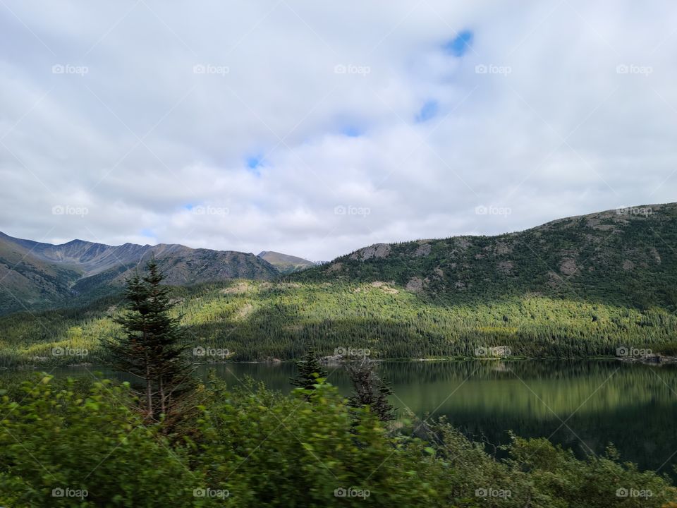 Emerald green waters with still reflections