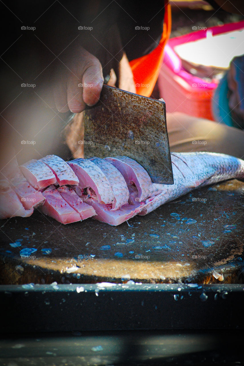 Cutting fish for cooking 