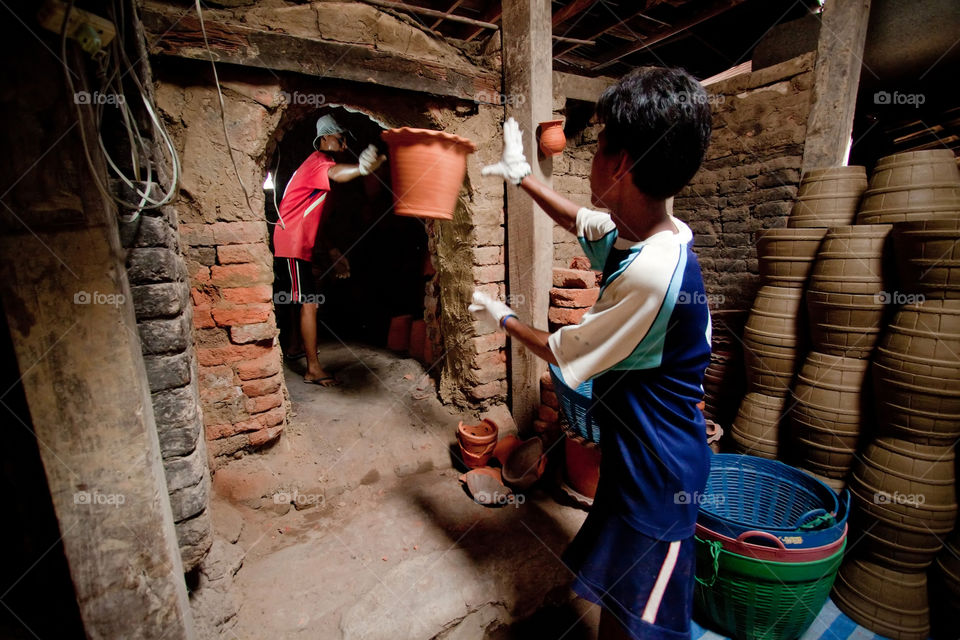 man working . clay pot