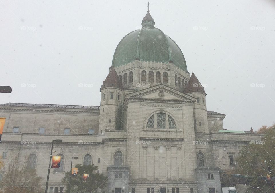 Oratoire Saint Joseph getting covered slowly by the snow.