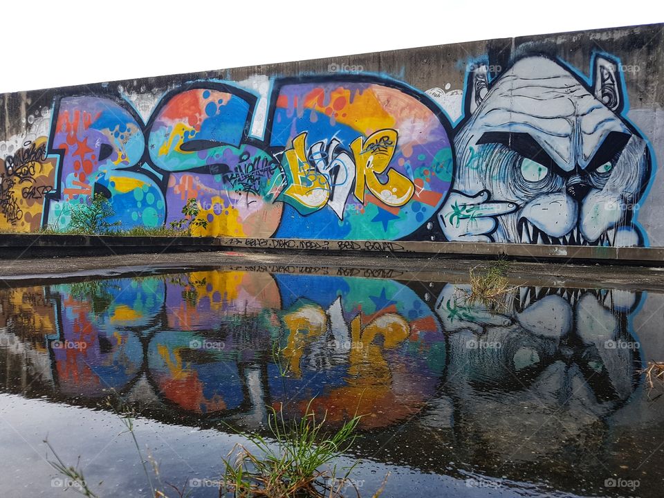 urban playground, colorful vivid street art graffiti reflection