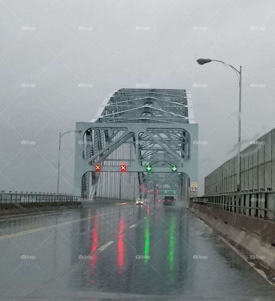 Getting ready to cross the bridge in the rain.