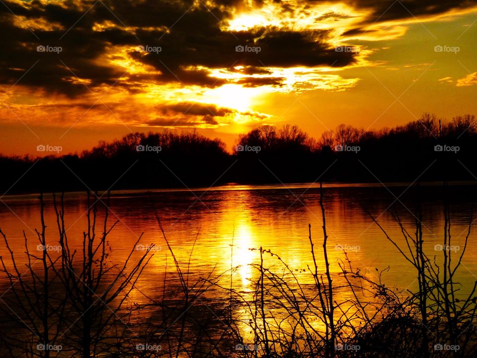 Cross on the lake in the sun.  