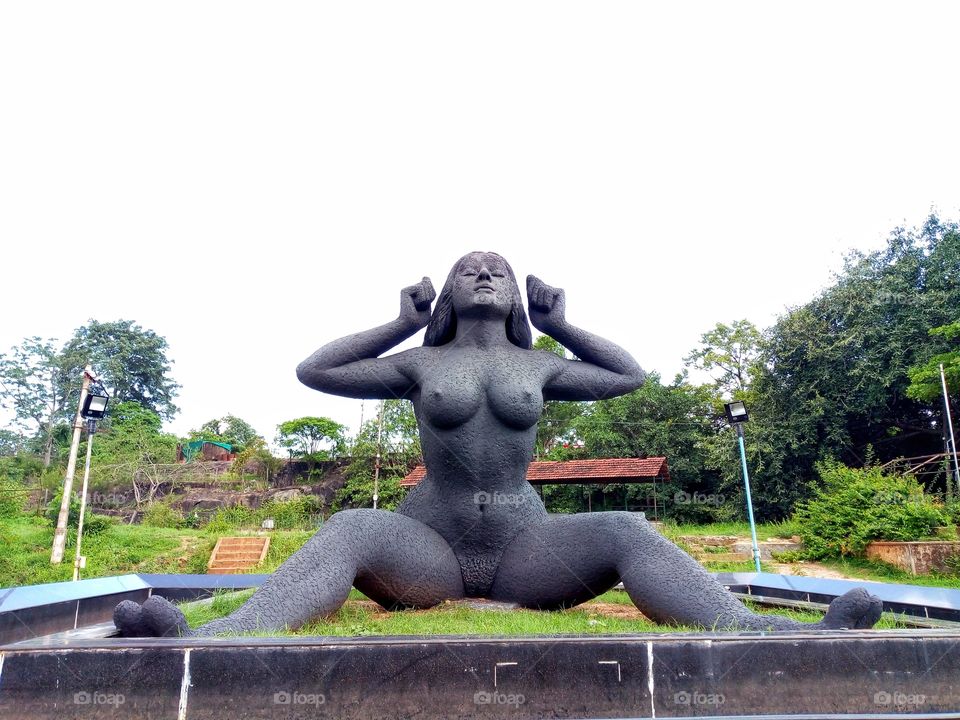 Yakshi statue Malampuzha. The iconic nude female statue in Kerala.India.