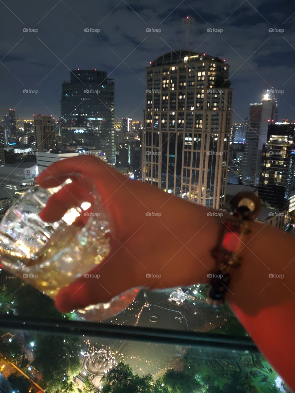 drink glass and city view