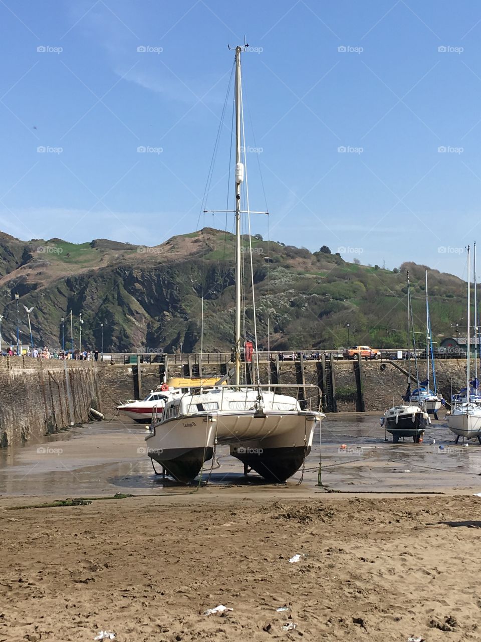 One of the many beautiful vessel that dock at Ilfracombe’s Harbour beach. Blue sky, gorgeous surroundings on a spring day 