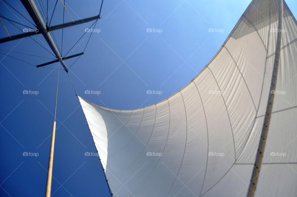 White sail and blue sky 