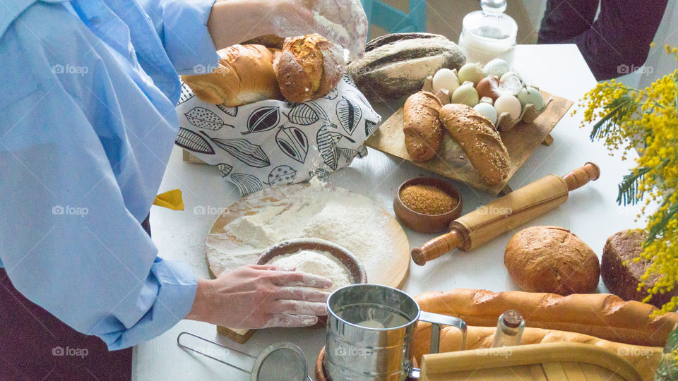 making dough from flour, eggs, sugar